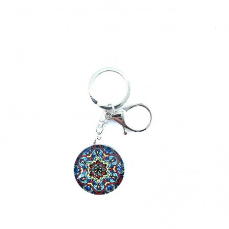 Porte clés avec un mandala en inclusion.