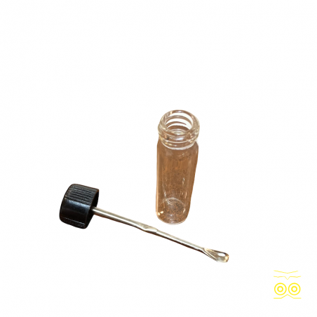 Flacon en verre avec un bouchon cuillère.