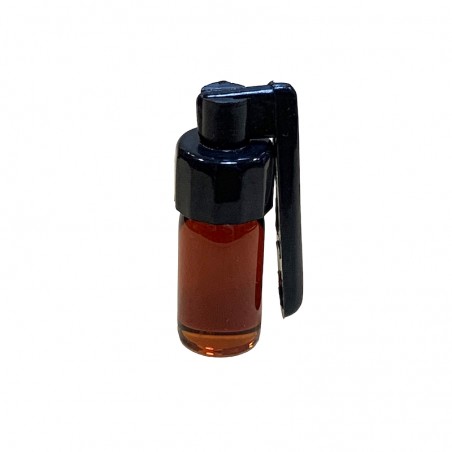 Perfume natural attar oud o agar en botella.