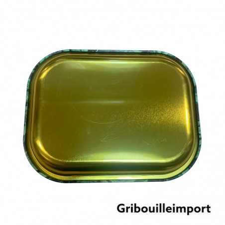 Back of the metal rolling tray with cannabis leaves.