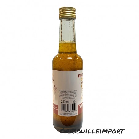 Bottle of Chebe oil.