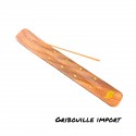 Wooden elephant incense holder for sticks.